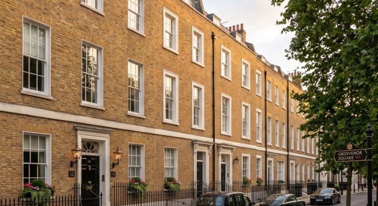 an elegant row of late Georgian townhouses on a quiet residential street near Grosvenor Square in Mayfair, London